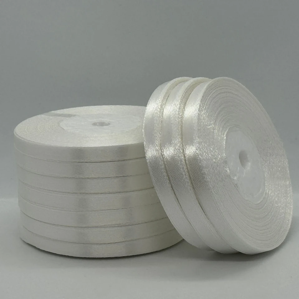 Атласная лента 0.6 см (33 м.), світлий молочний